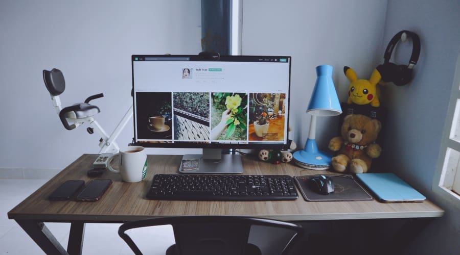 Computer workspace displaying a custom web design project on screen.